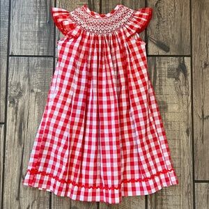 Smocked Auctions Red and White Gingham Bishop Dress with ric rac trim.